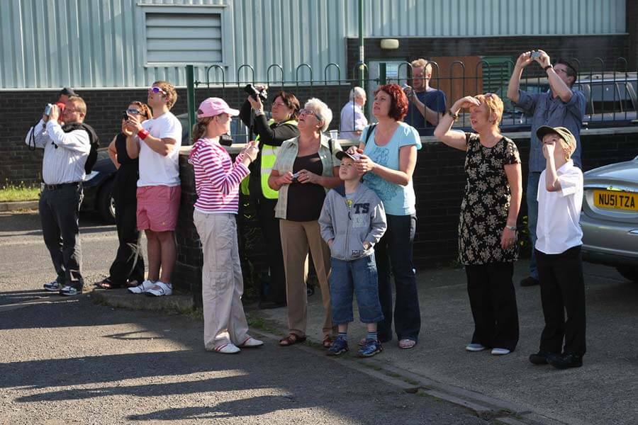 Families and friends gather to watch lift